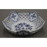 A Meissen reticulated porcelain blue and white bowl. 22 cm diameter.