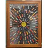 A British Fields Sports Society shotgun cartridge display, housed in a glazed cabinet. 68 x 91 cm.