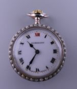 An Edwardian silver fob watch with enamelled dial and Swiss jewel movement, in working order.