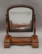 A Victorian mahogany toilet mirror. 68 cm wide.