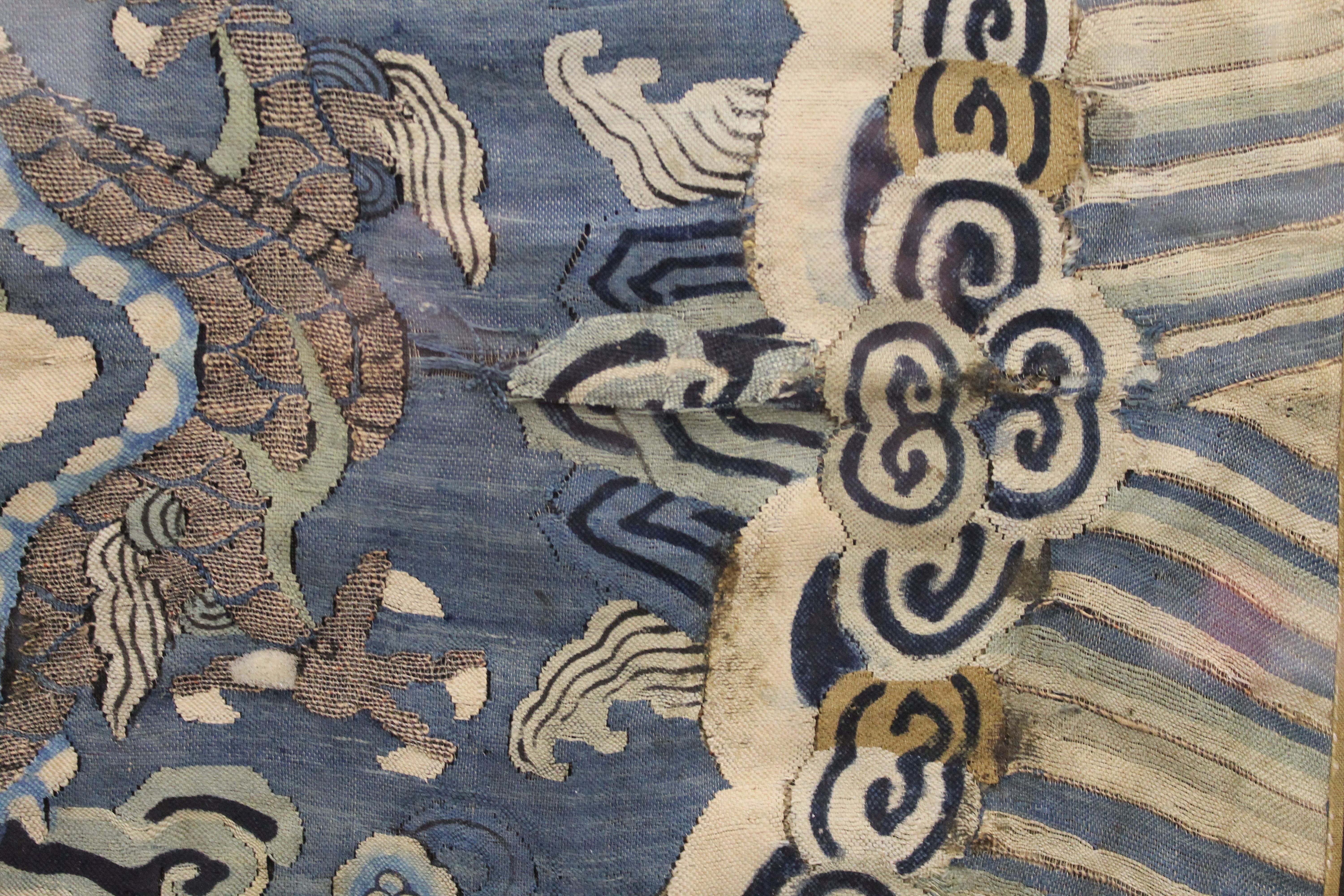 A large 18th/19th century Chinese embroidery decorated with dragons. 102 cm wide. - Image 4 of 5