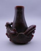 A Chinese horn snuff bottle. 6.5 cm high.