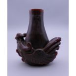 A Chinese horn snuff bottle. 6.5 cm high.