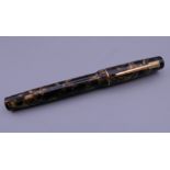 A Croxley fountain pen with 14 ct gold nib.
