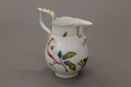 A 19th century unmarked porcelain jug, possibly Meissen/Berlin. 13 cm high.