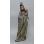 A bronze model of Guanyin and a child. 59 cm high.