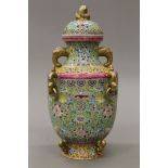 A Chinese porcelain turquoise and yellow ground lidded baluster vase. 41 cm high.