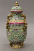 A Chinese porcelain turquoise and yellow ground lidded baluster vase. 41 cm high.