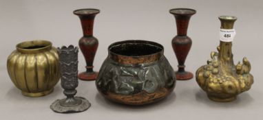 A quantity of Eastern metalware vases. The largest 14.5 cm high.