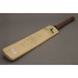 A cricket bat from the Nottinghamshire County Cricket Club 2001, signed by the England Team.