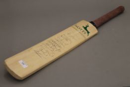 A cricket bat from the Nottinghamshire County Cricket Club 2001, signed by the England Team.