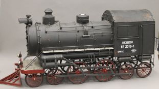 A large metal model of a steam locomotive. 116 cm long.