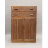A 20th century two door and two drawer cupboard. 83 cm wide.