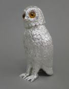 A silver plated owl form sugar sifter. 14.5 cm high.