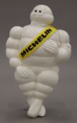 A vintage plastic model of the Michelin Man. 22 cm high.