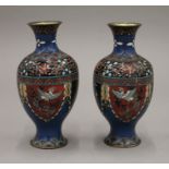 A pair of cloisonne vases. 18 cm high.
