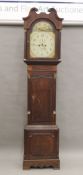 A 19th century oak and mahogany eight-day longcase clock. 228 cm high.