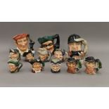 A collection of Royal Doulton character jugs.