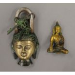 A padlock formed as the bust of Buddha and a small bronze model of Buddha. The former 15 cm high.