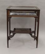 A Victorian mahogany bijouterie table. 58.5 cm wide, 76.5 cm high, 41 cm deep. (cabinet depth 14.