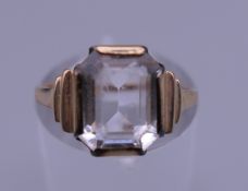 A 9 ct gold stone set ring. Ring size L/M. 2.1 grammes total weight.