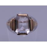A 9 ct gold stone set ring. Ring size L/M. 2.1 grammes total weight.