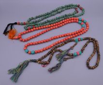 Three sets of beads. The longest 103 cm long.