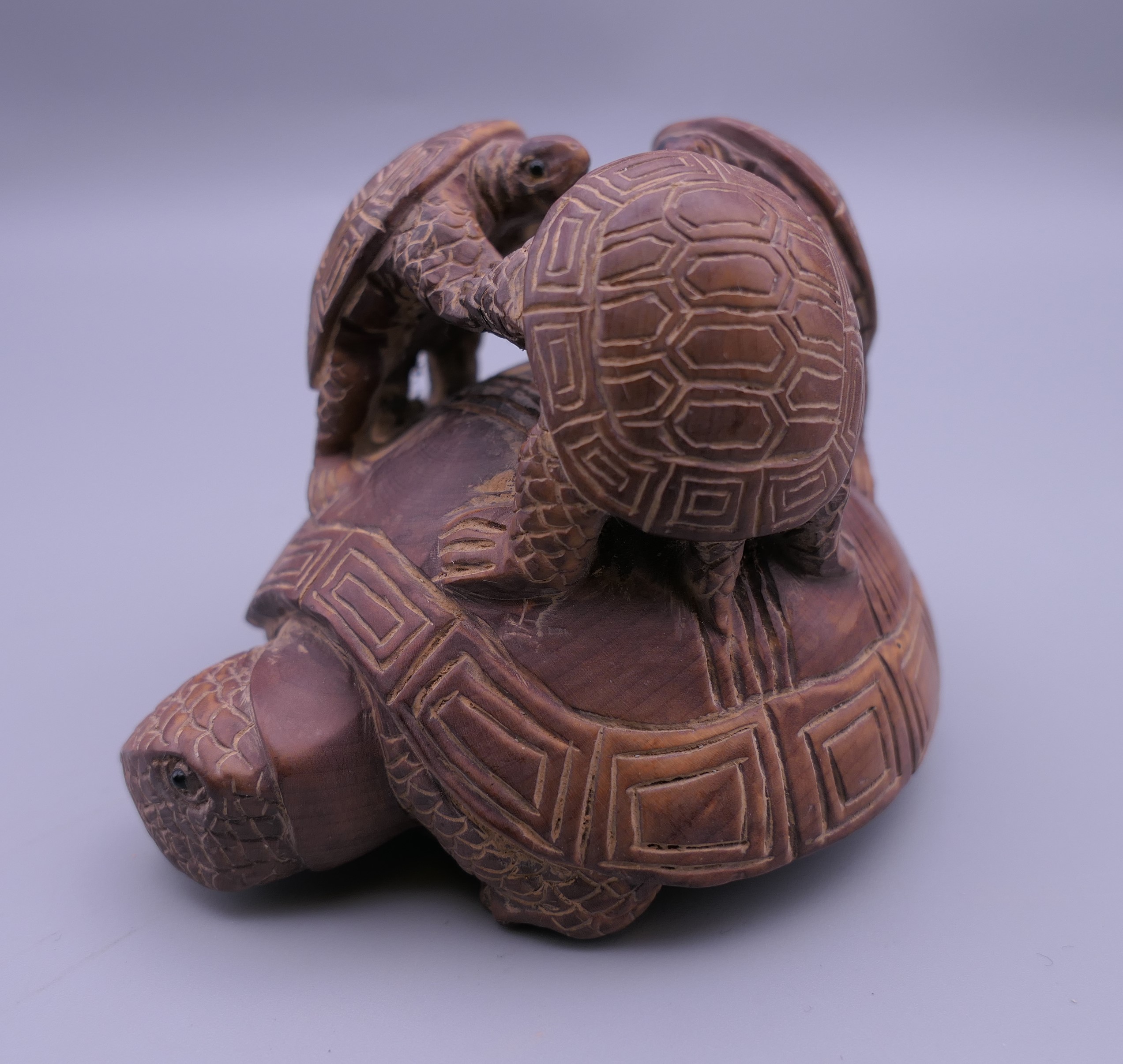 A Japanese carved wooden tortoise group. 6.5 cm high. - Image 3 of 3