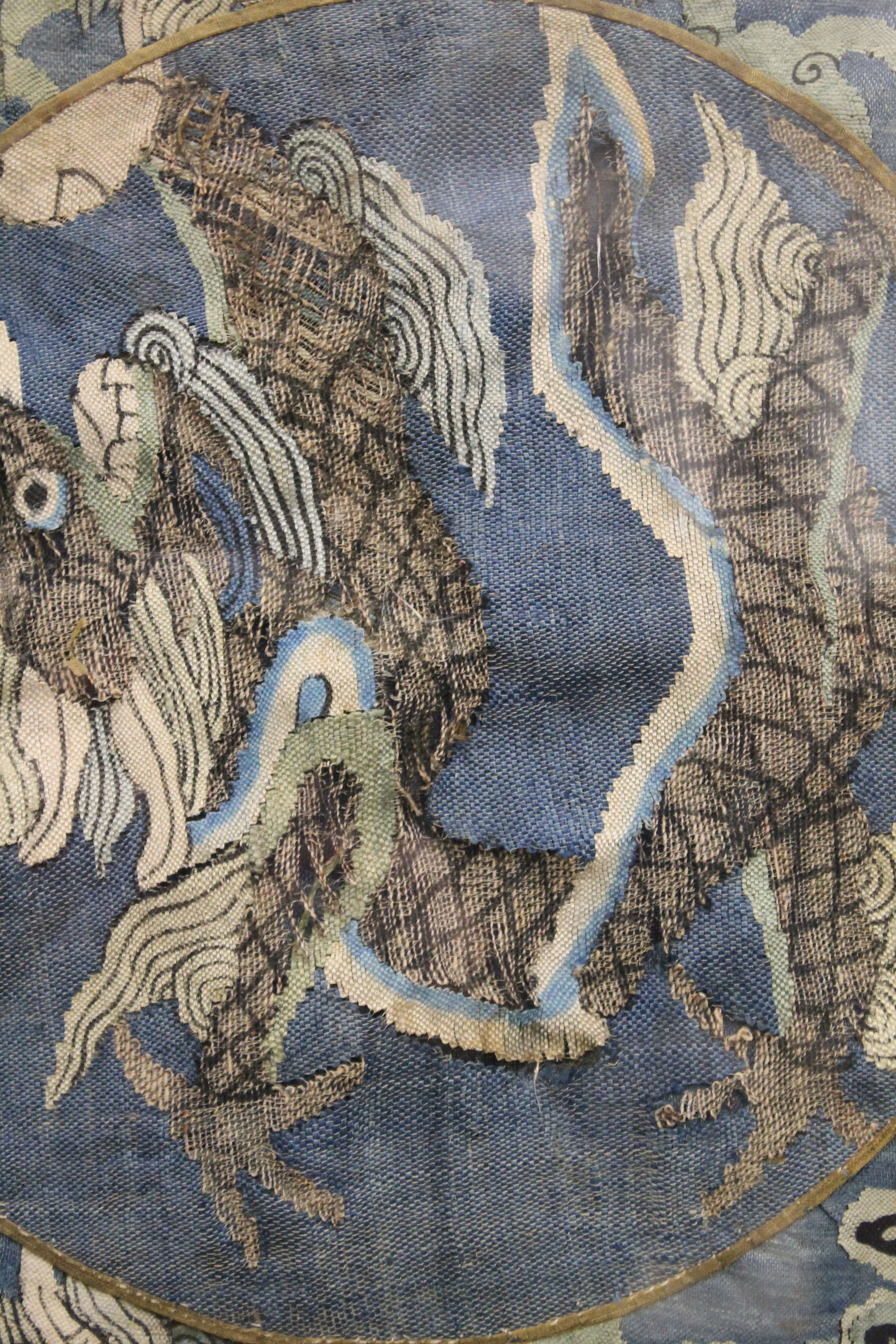 A large 18th/19th century Chinese embroidery decorated with dragons. 102 cm wide. - Image 2 of 5