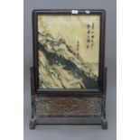 A Chinese hardstone table screen. 80 cm high.