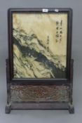 A Chinese hardstone table screen. 80 cm high.