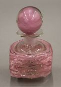 A Medina pink glass scent bottle. 12.5 cm high.