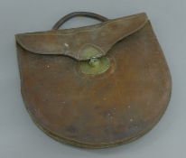 A Victorian leather shooting pouch. 27 cm wide.