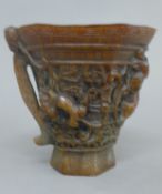 A libation cup. 13.5 cm high.