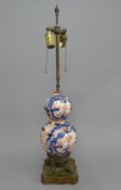 An Imari double gourd vase mounted as a lamp. The vase section 27 cm high.