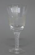 A 1973 Ely Cathedral Commemorative engraved air twist stem wine glass. 17 cm high.