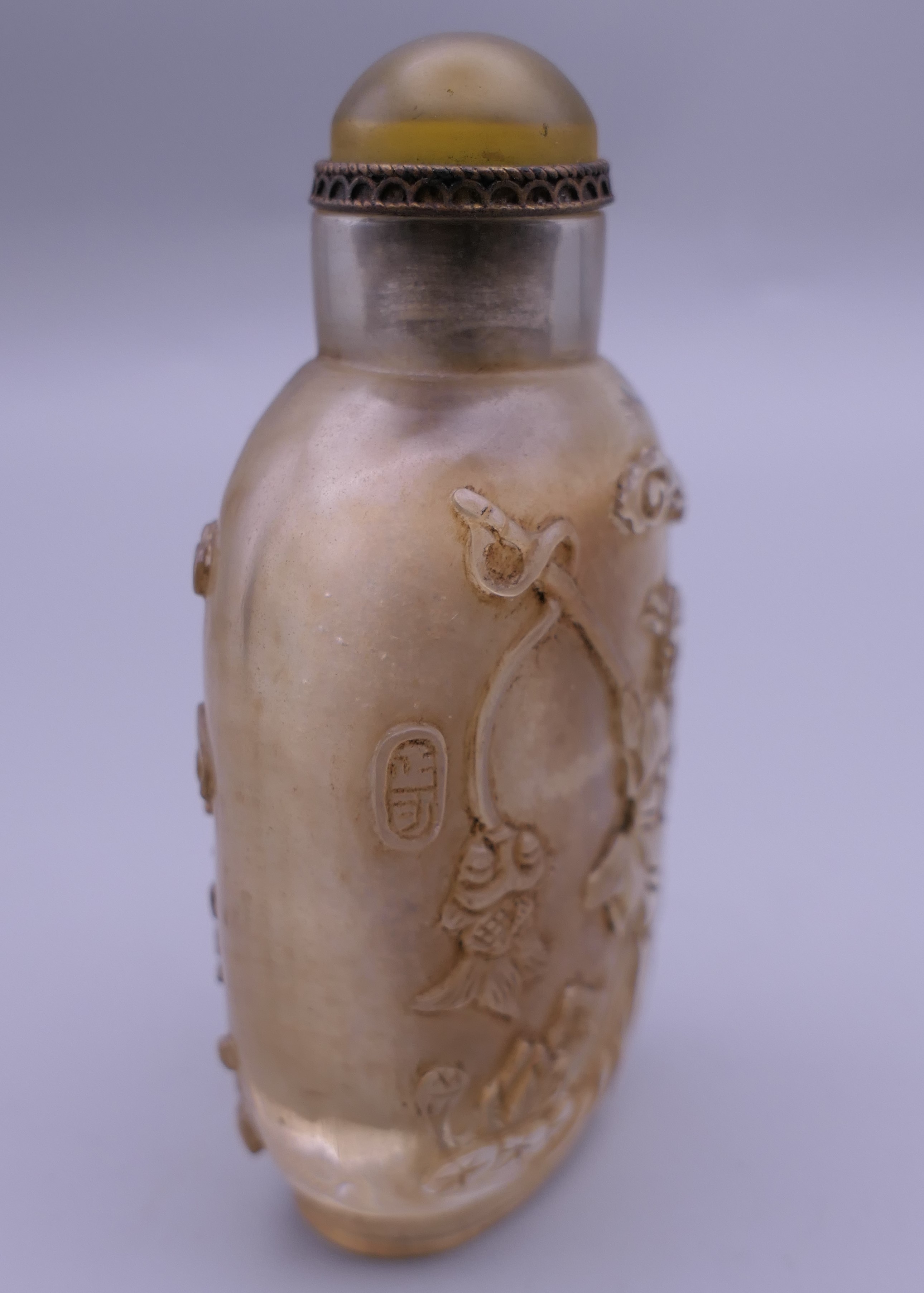 A Chinese carved glass snuff bottle. 9 cm high. - Image 3 of 4