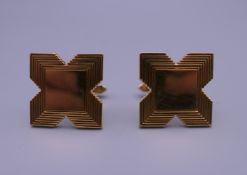 A pair of 9 ct gold Garrard & Co London cufflinks. Approximately 19 mm square. 14.4 grammes.