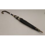 An early 20th century ladies tortoiseshell handled umbrella owned by Lalocke Huth of 44 Upper