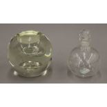 A glass scent bottle and a glass tealight holder. The former 9.5 cm high.