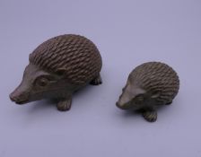 Two bronze models of hedgehogs. The largest 5 cm long.