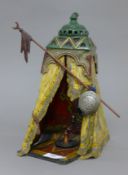 A cold painted bronze model of an Arab tent. 31 cm high.