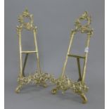 A pair of brass table easels. 39.5 cm high.