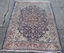 A Sarouk rug. 210 x 140 cm.