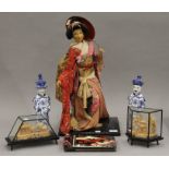 A quantity of Oriental items, including a model of a geisha,