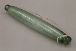 A glass rolling pin. 39 cm long.