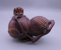 A Chinese wooden double gourd snuff bottle. 7.5 cm long.