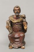 A 17th/18th century polychrome painted carved wooden (with some adaptions/restorations) figure,