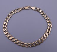 A 9 ct gold gentleman's bracelet. 14.2 grammes.