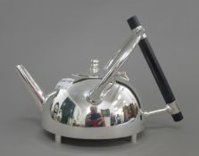 A Christopher Dresser style teapot. 15 cm high.